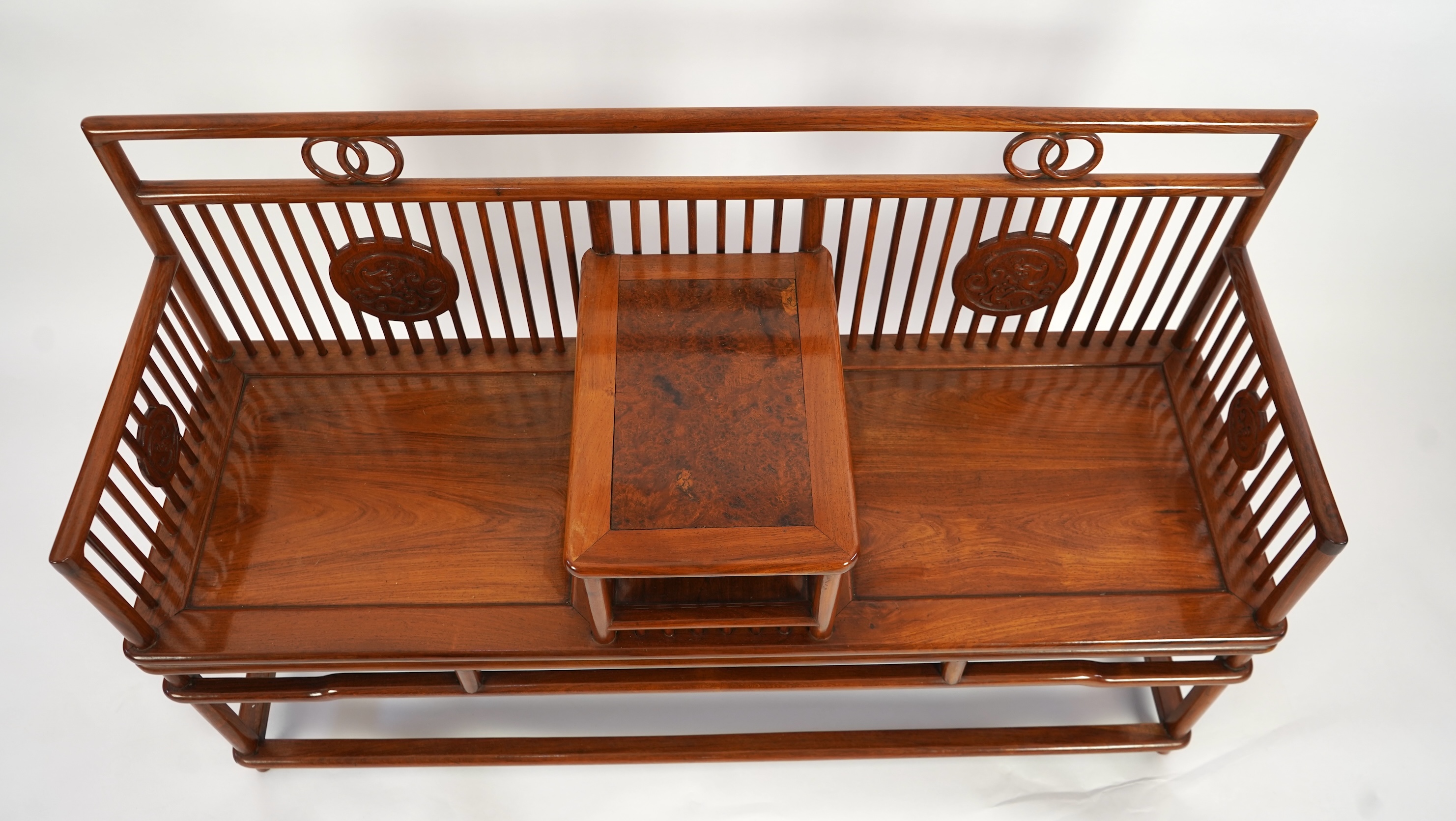 A Chinese hardwood and burrwood inset spindle-back bench, early 20th century